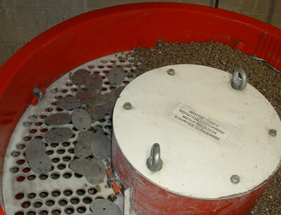 Parts in a vibratory finishing machine.